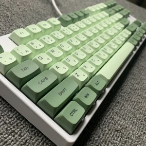 Bright green Matcha keycaps arranged neatly, ready for customization. Shop at RockatShip