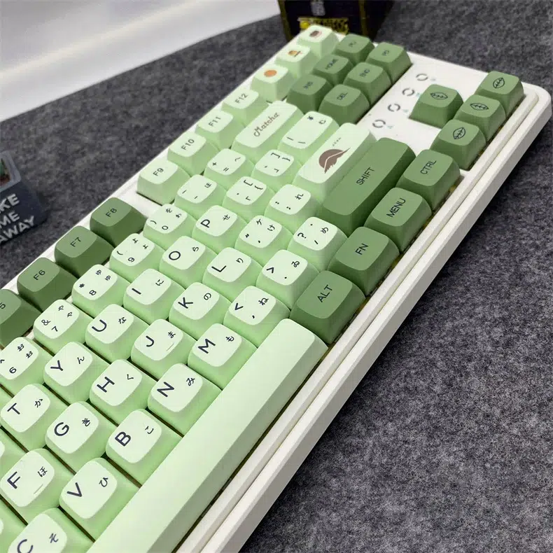 Sleek mechanical keyboard fitted with Matcha keycaps. Transform your setup at RockatShip